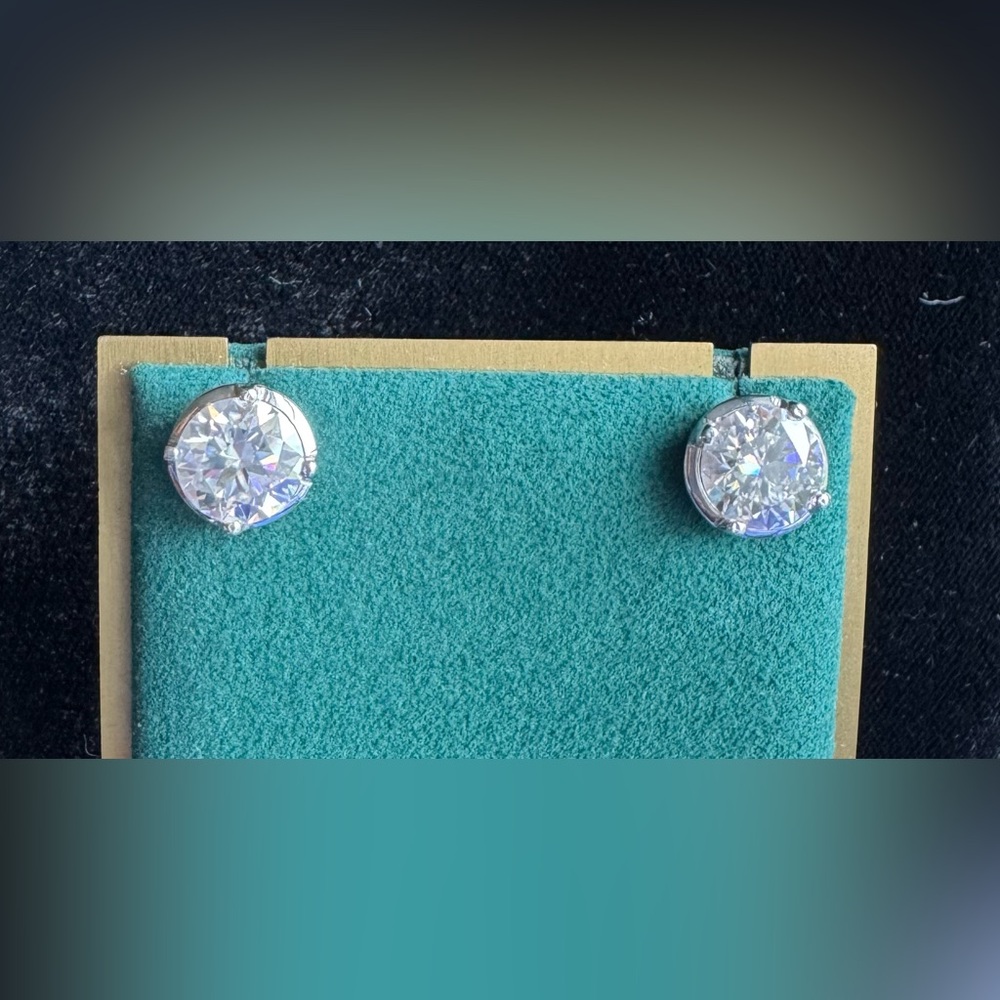 Stunning 3 carat moissanite (total 6carat) set in 14k solid white gold.